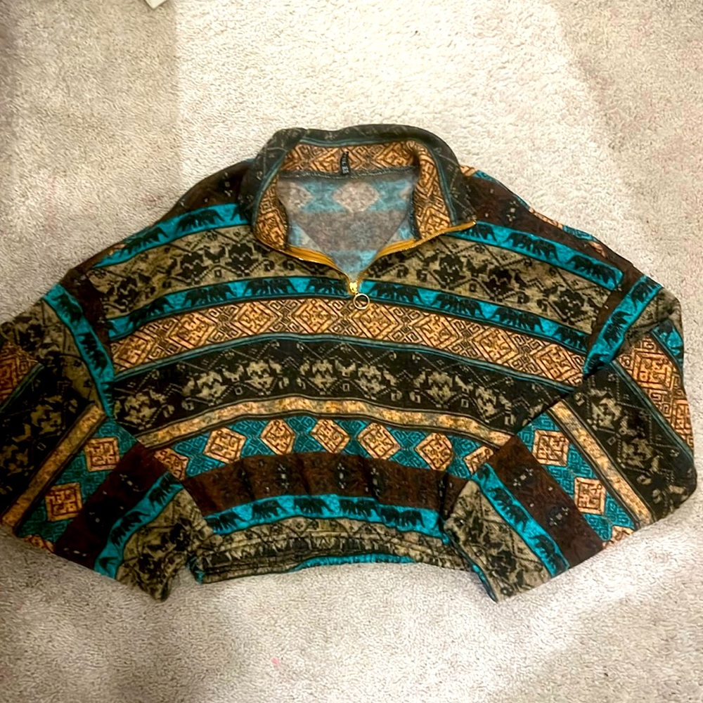I am selling a cropped fleece have zip butt pull over